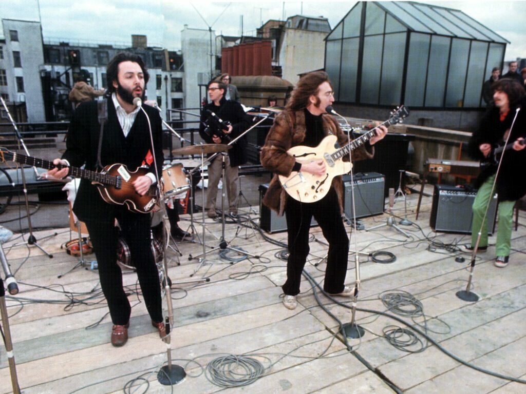 The Beatles using Neumann KM84 microphones